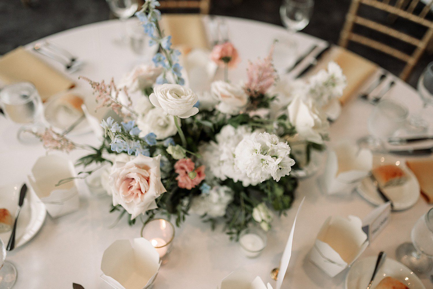 Tess and Grant's dessert table display at their Discovery World Pavilion wedding