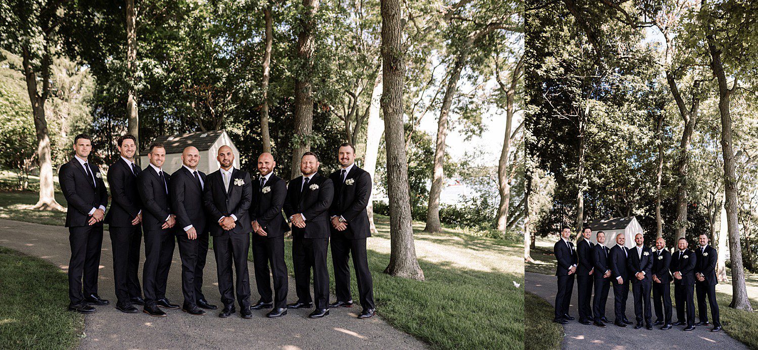 Josh and his seven groomsmen posing together before the Heidel House wedding ceremony