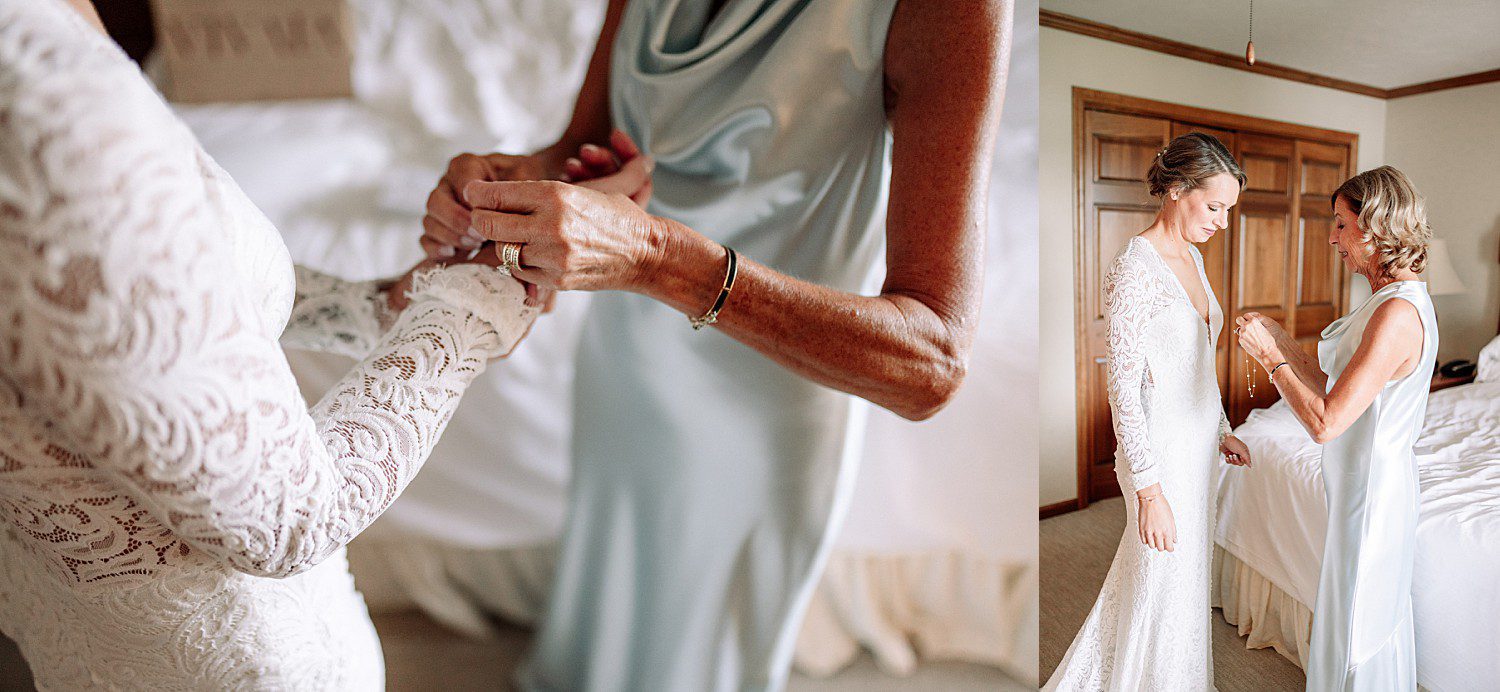 Kathryn's mom helping with her lace sleeve as she gets ready at The Osthoff Resort in Elkhart Lake, Wisconsin
