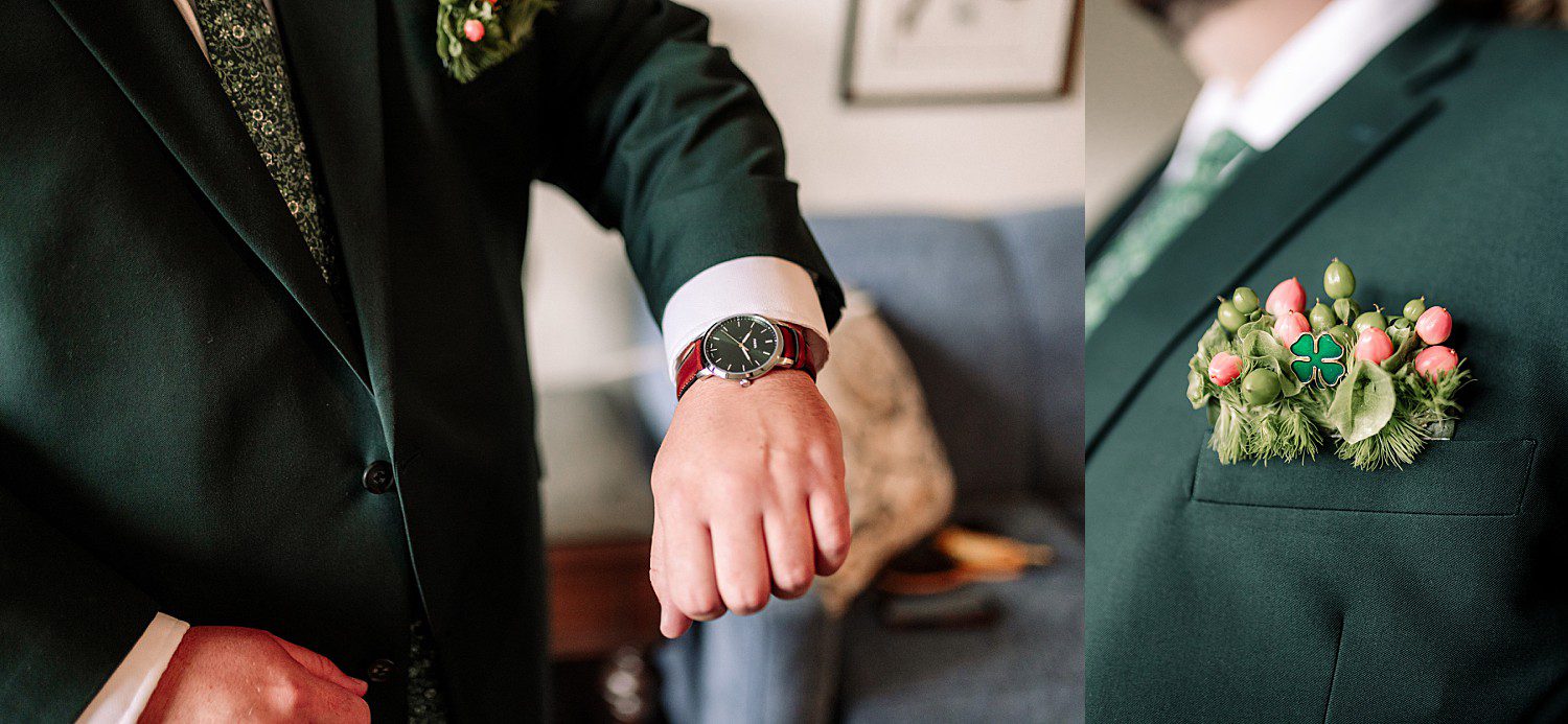 Logan checking his watch in his green suit while getting ready for his wedding at The Osthoff Resort in Elkhart Lake, Wisconsin