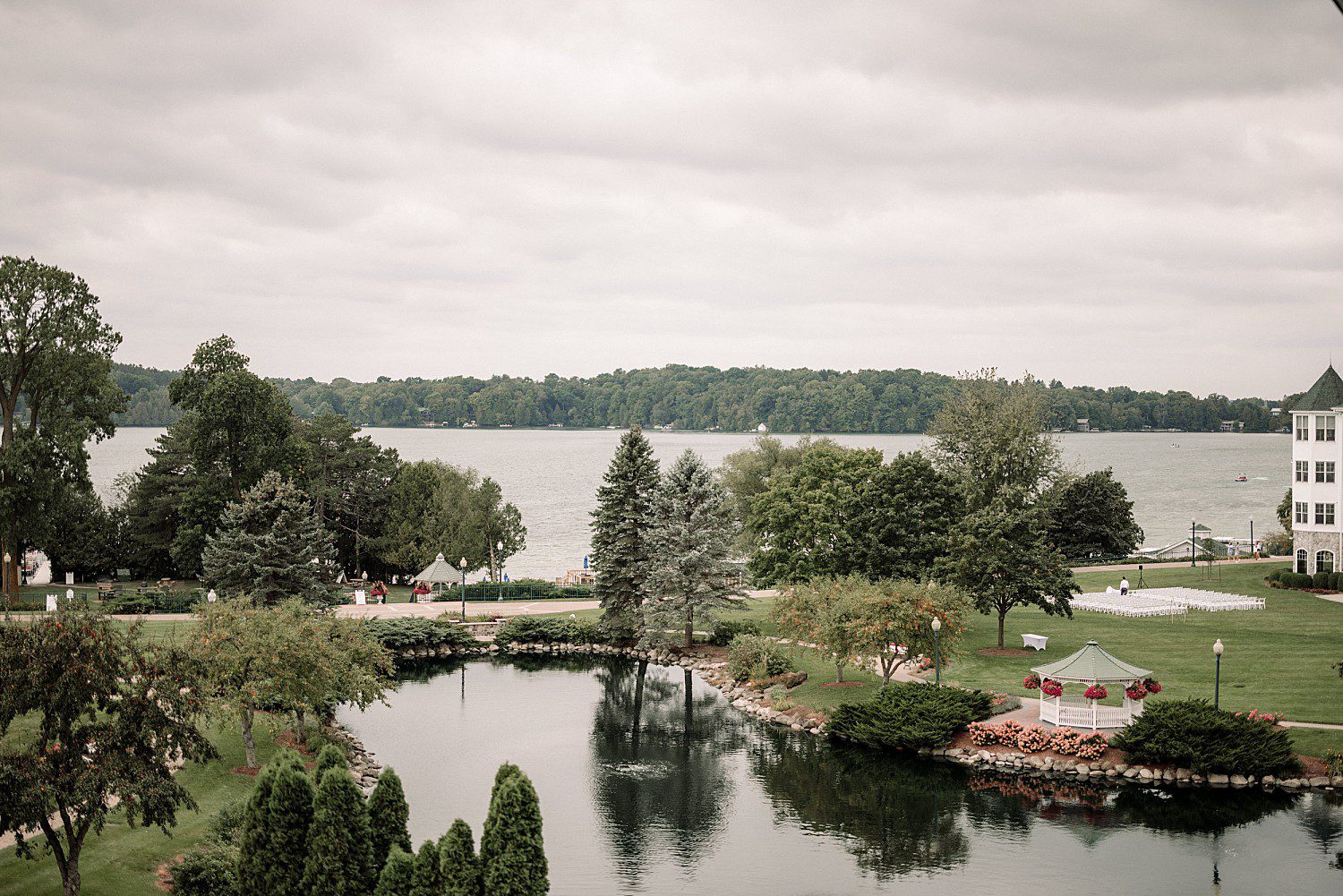 Overcast September view of the lakeside ceremony lawn and pond at The Osthoff Resort in Elkhart Lake, Wisconsin