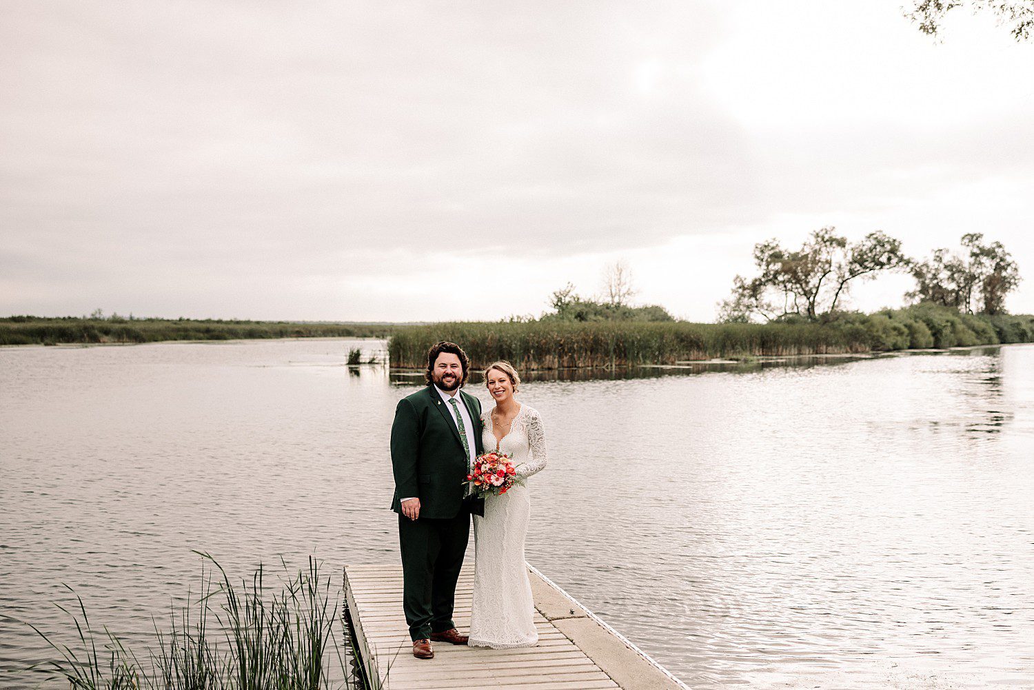 Kathryn and Logan standing on a dock over the water at Sheboygan Marsh near Elkhart Lake, Wisconsin
