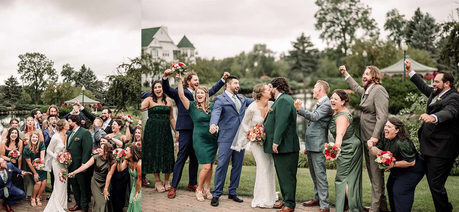 Kathryn and Logan kissing as their wedding party cheers at The Osthoff Resort in Elkhart Lake, Wisconsin