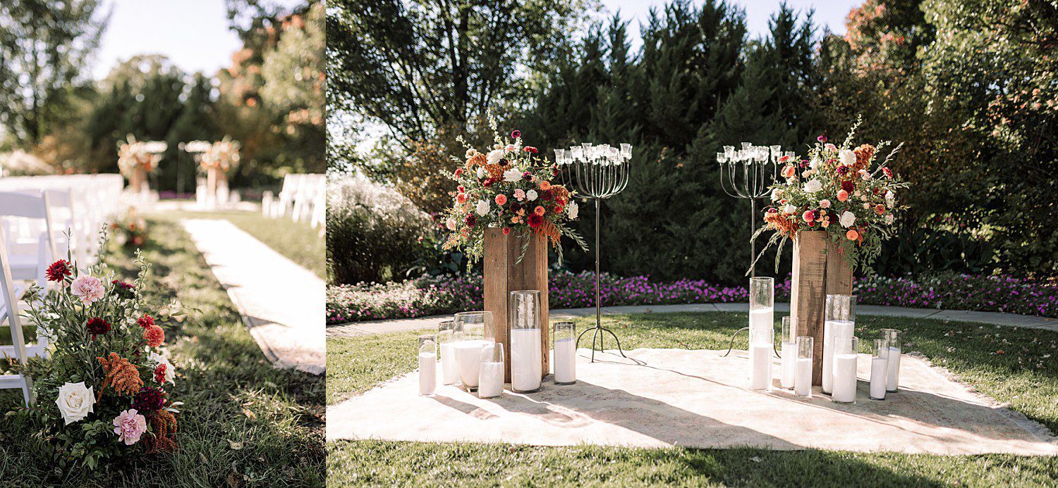 Noelle and Noah's fall ceremony setup with pillar candles and wooden floral stands at Boerner Botanical Gardens in Hales Corners, Wisconsin