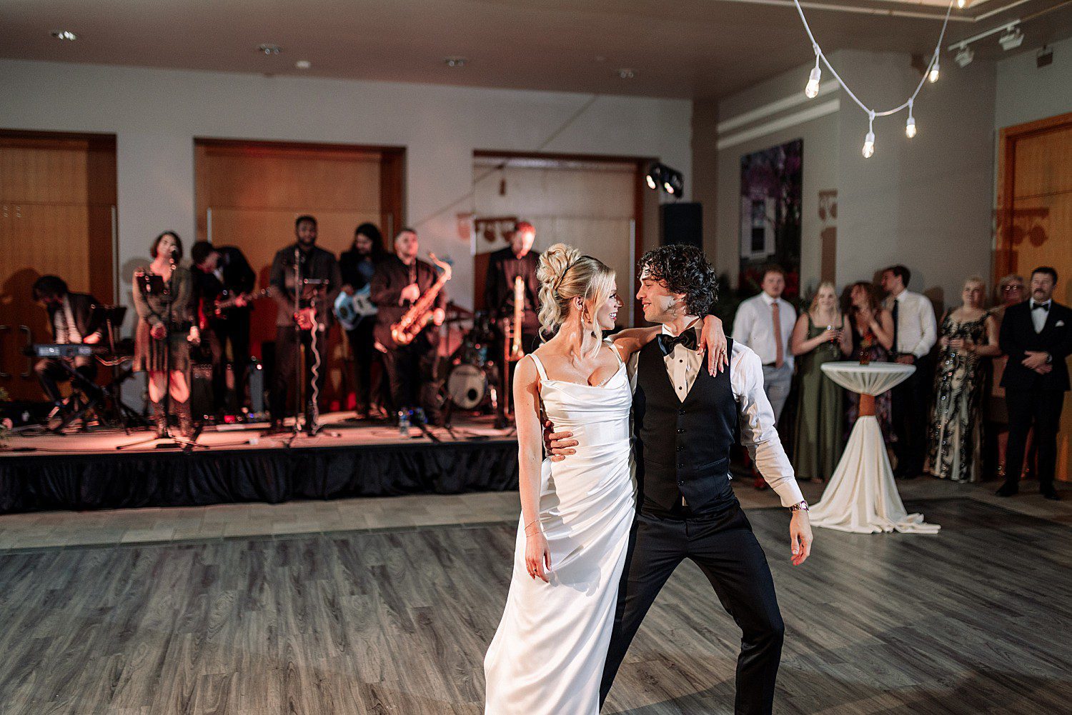 Noelle and Noah dancing to Blue Water Kings at their reception at Boerner Botanical Gardens in Hales Corners, Wisconsin