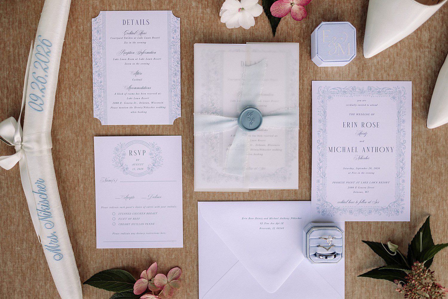 lakeside Wisconsin wedding in Delavan, Wisconsin: Erin and Michael wedding invitation suite, blue wax seal, rings, and personalized ribbon.