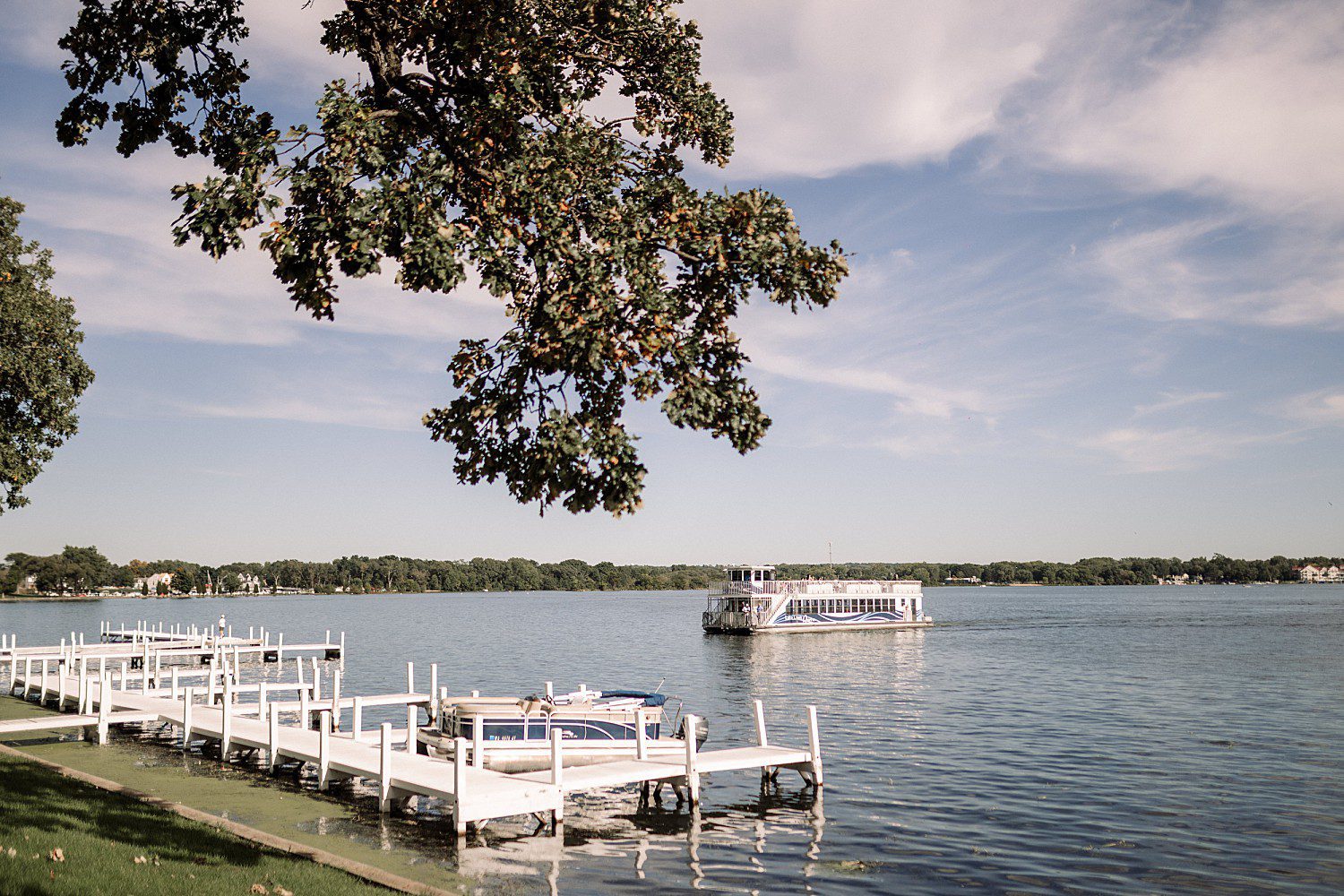 lakeside Wisconsin wedding in Delavan, Wisconsin: Delavan Lake shoreline, docks, and a boat on the water.